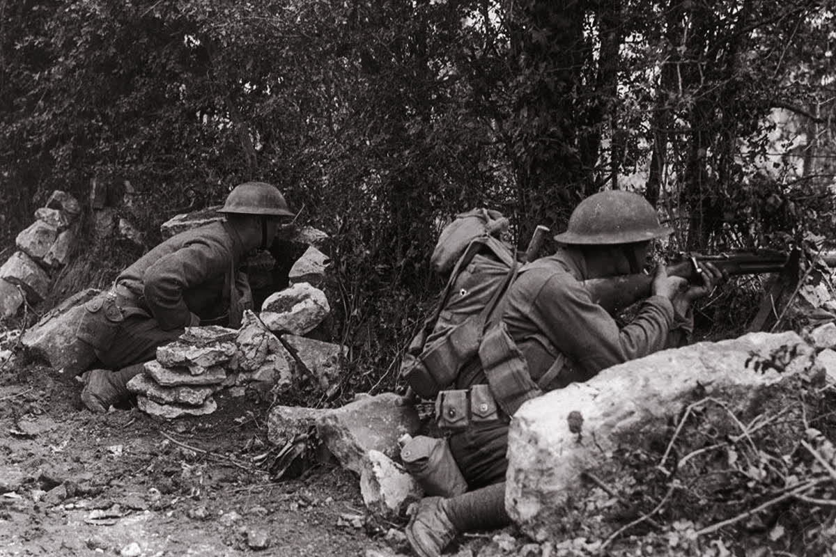 Infantrymen of the U.S. 2nd Division firing from cover in Belleau Wood, June 1918
